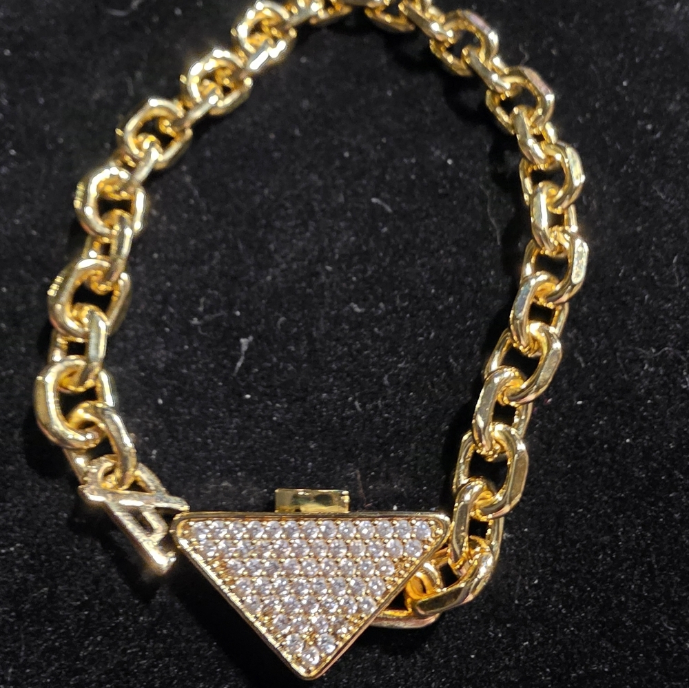 USED...Elegant Prada Gold Chain Bracelet with Triangle Pendant And Crystals